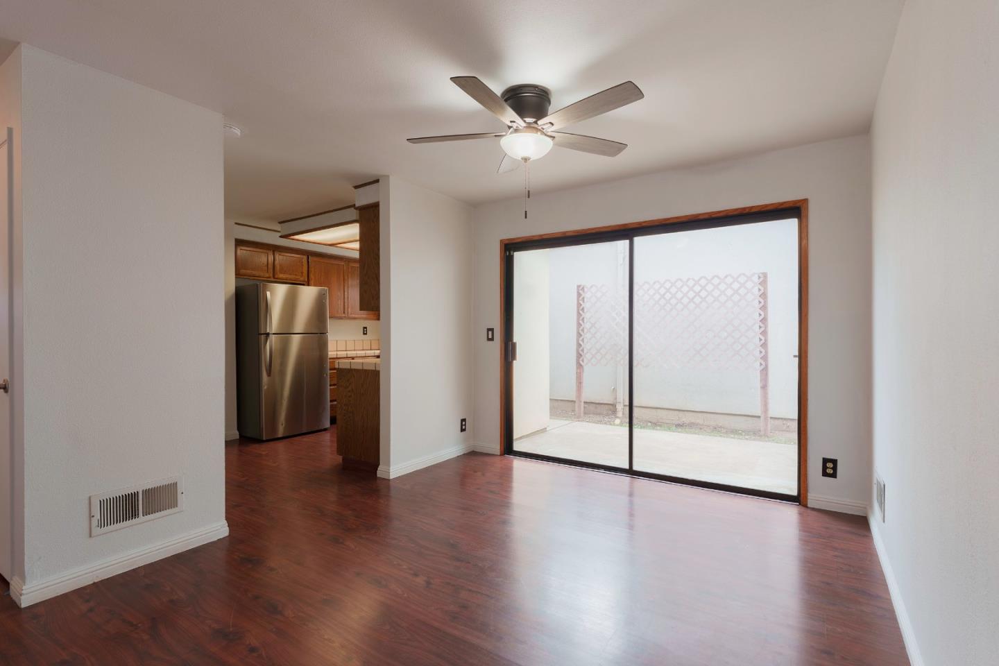 1549 North First Street Salinas, CA 93906 - Photo 10 of 25 an empty room with wooden floor fan and windows