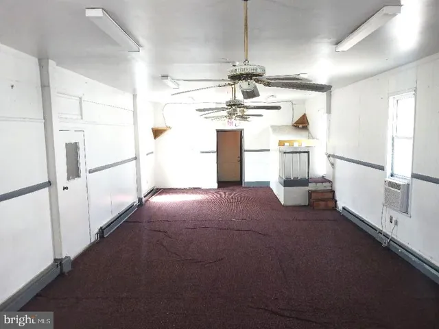 a view of a room with a furniture