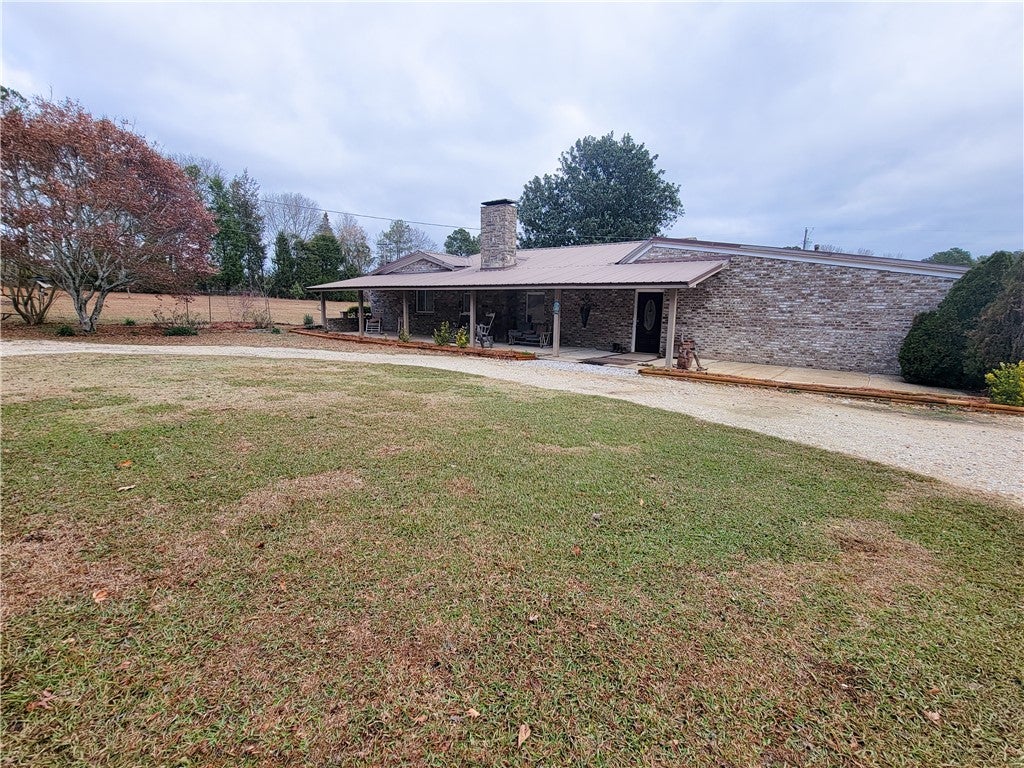 1555 Pear Tree Road Waverly, AL 36879 - Photo 40 of 45 Front of house with circular driveway