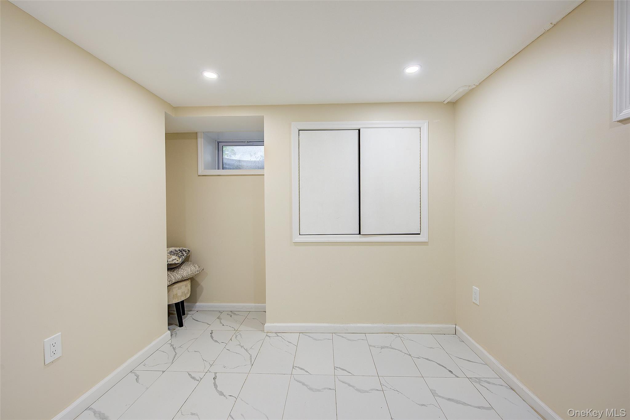 164-38 76th Road Queens, NY 11366 - Photo 36 of 44 an empty room with closet