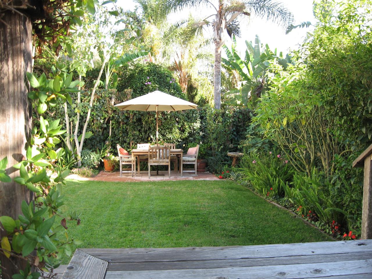 20 East Junipero Street Santa Barbara, CA 93105 - Photo 5 of 14 a view of a chair and table on the garden