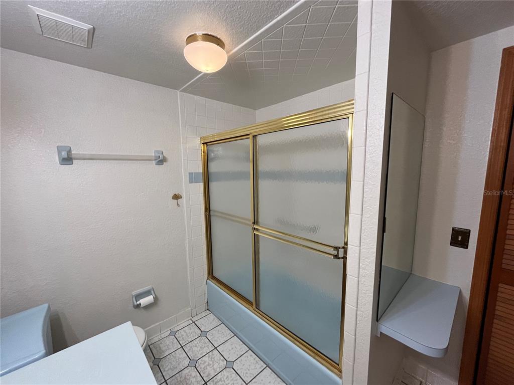 6560 Timberlane Road Lake Wales, FL 33898 - Photo 18 of 31 a bathroom with a shower