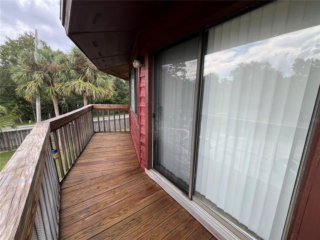6560 Timberlane Road Lake Wales, FL 33898 - Photo 19 of 31 a view of balcony with wooden floor