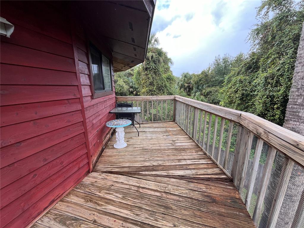 6560 Timberlane Road Lake Wales, FL 33898 - Photo 21 of 31 a view of deck with wooden floor and outdoor space