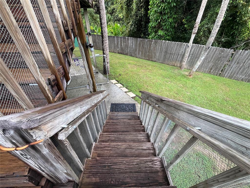 6560 Timberlane Road Lake Wales, FL 33898 - Photo 25 of 31 a view of deck with wooden floor and fence