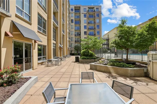 a sign on the brick wall