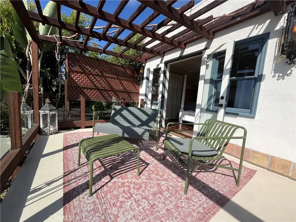 a view of a chairs in wooden deck