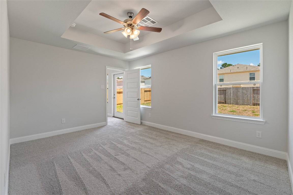 10641 Ellerston Road Cleveland, TX 77327 - Photo 17 of 34 a view of an empty room with a window