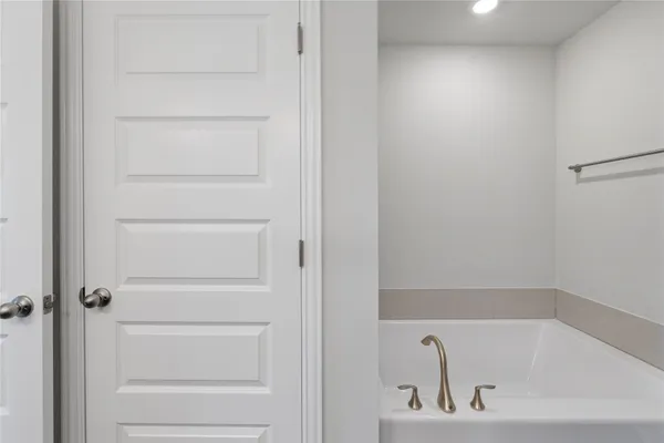 a bathroom with a bathtub