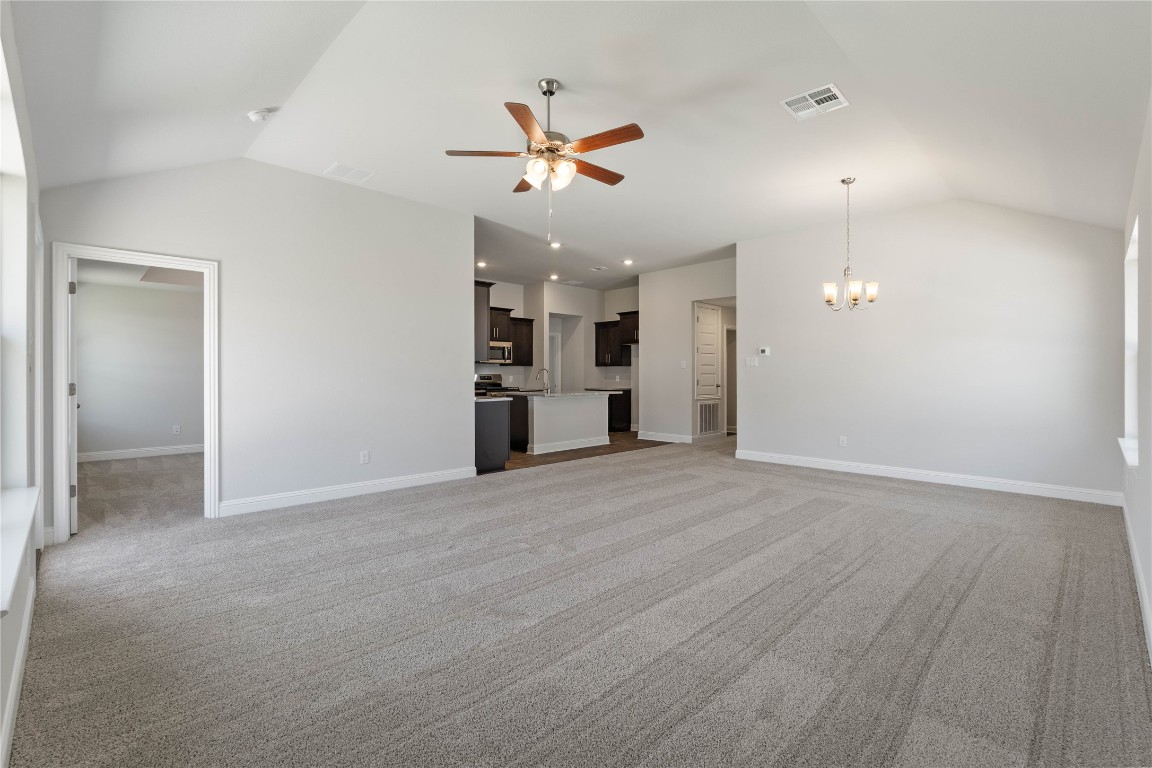 10641 Ellerston Road Cleveland, TX 77327 - Photo 6 of 34 an empty room with cabinet and windows