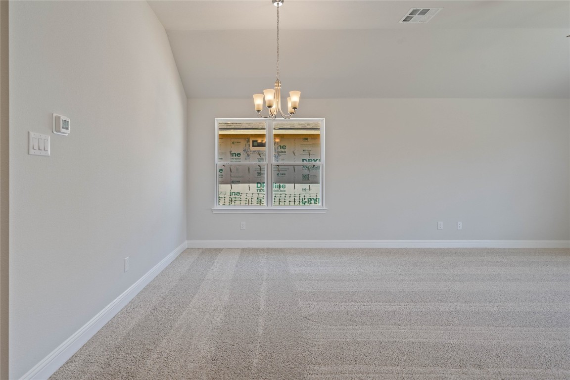 10641 Ellerston Road Cleveland, TX 77327 - Photo 9 of 34 a view of an empty room with a window