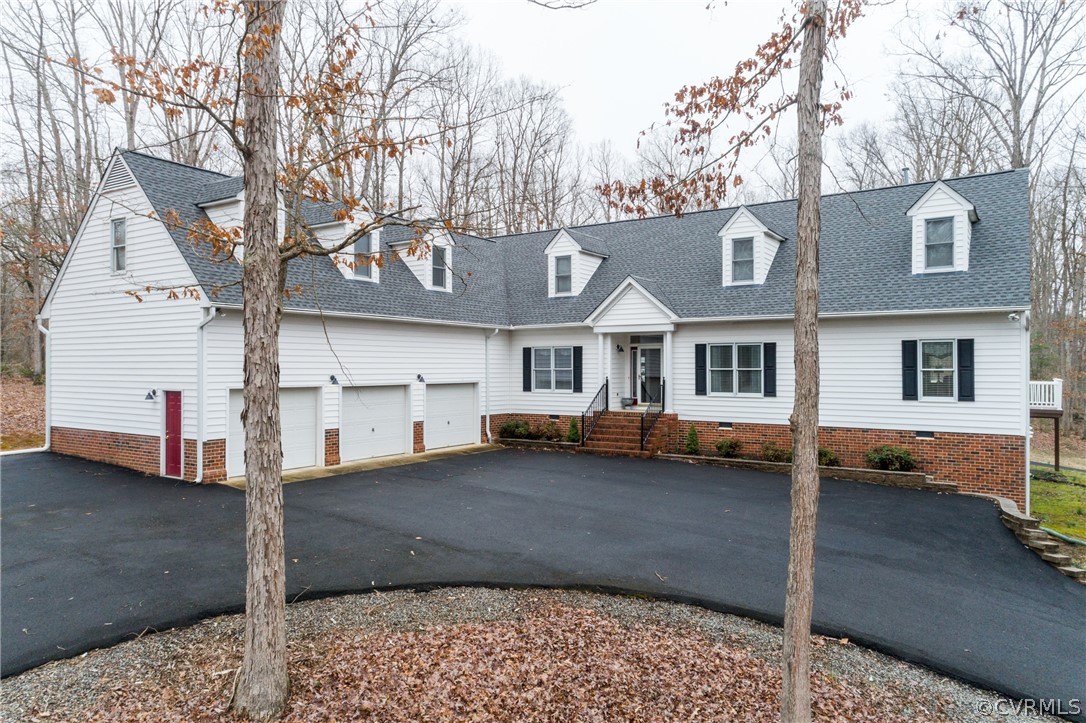 2130 Alldever Road Maidens, VA 23102 - Photo 1 of 30 a view of a white house with a large tree