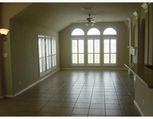 6117 Garden Court Corpus Christi, TX 78414 - Photo 2 of 9 a view of an empty room with a window