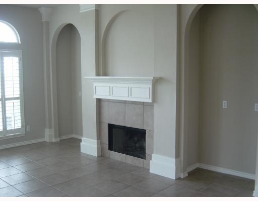 6117 Garden Court Corpus Christi, TX 78414 - Photo 6 of 9 a view of a livingroom with a fireplace