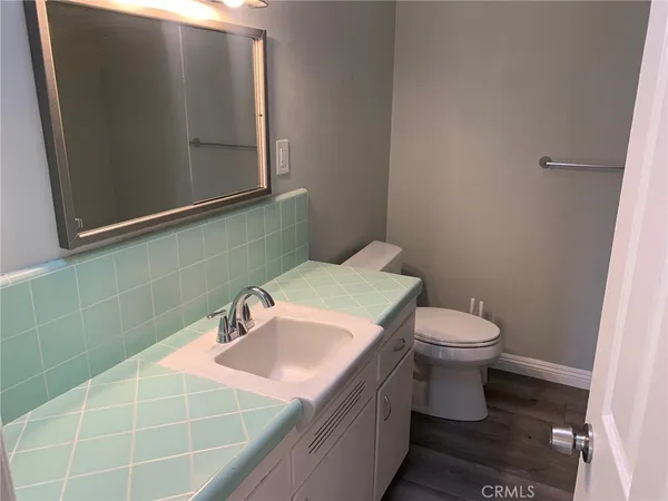 a bathroom with a sink and a toilet
