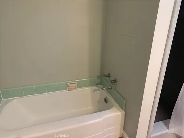 a bathroom with a bathtub