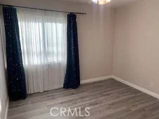 a bathroom with a toilet and a bathtub