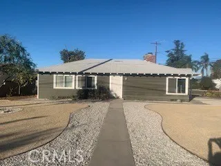 front view of a house with a patio
