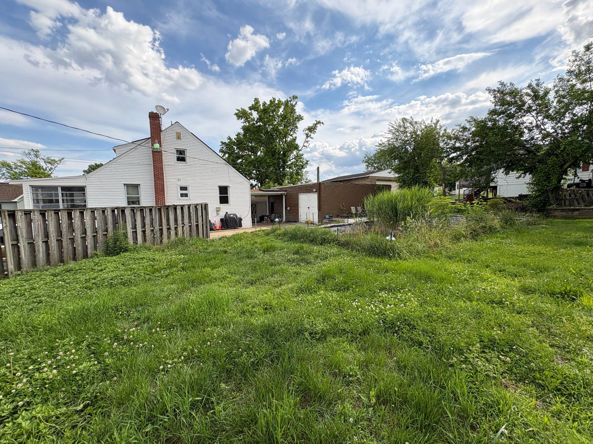 1621 Rosewick Avenue Rosedale, MD 21237 - Photo 37 of 37 Spacious backyard with greenery.