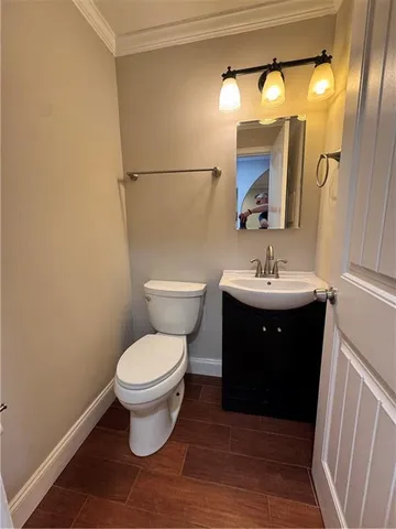 a bathroom with a sink and a toilet