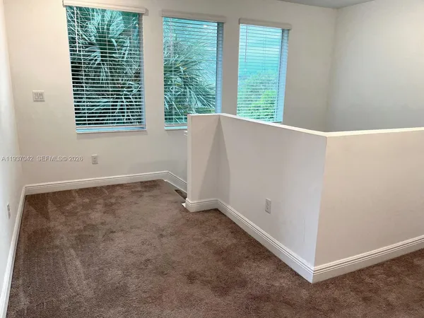 a bed room with a bed and a desk