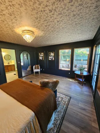 a view of a backyard with plants and garden