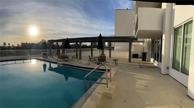 a view of a balcony with chairs