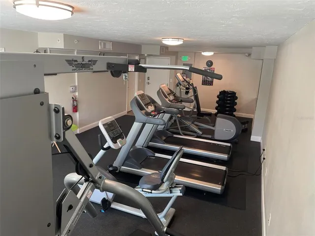 a view of a room with gym equipment