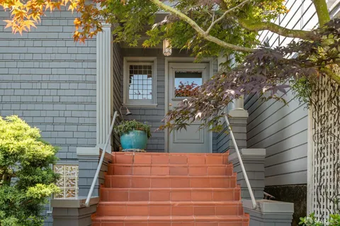 a view of house with outdoor space