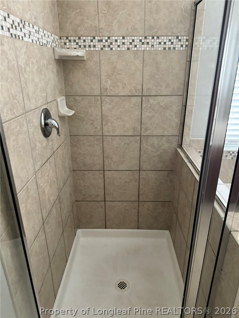 350 River Oak Street Spring Lake, NC 28390 - Photo 21 of 27 a bathroom with a shower