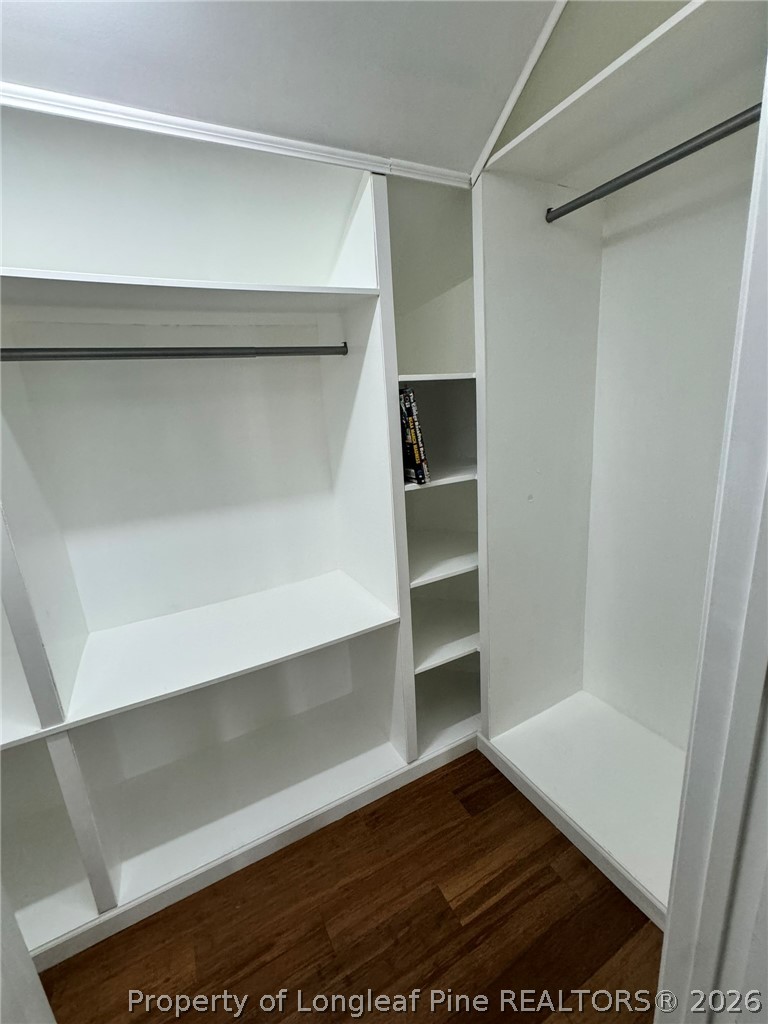 350 River Oak Street Spring Lake, NC 28390 - Photo 23 of 27 a view of walk in closet with empty racks