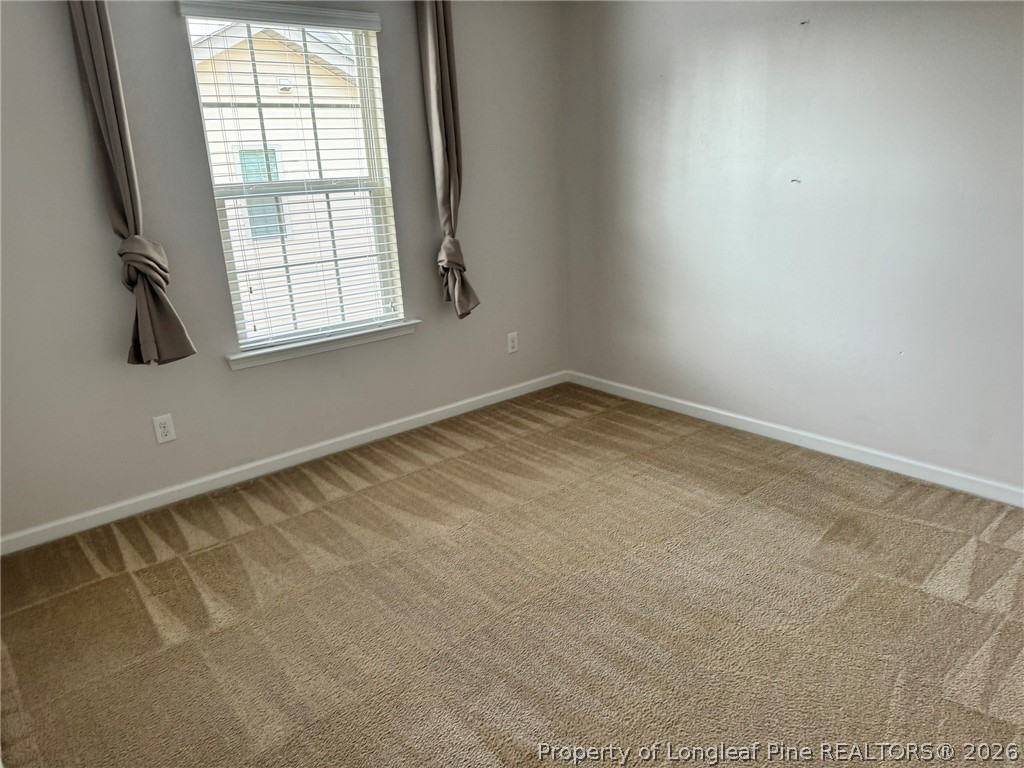 350 River Oak Street Spring Lake, NC 28390 - Photo 24 of 27 an empty room with windows