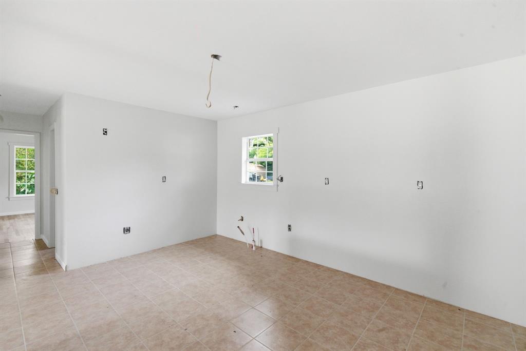 203 North Kickapoo Street Lipan, TX 76462 - Photo 10 of 28 a view of an empty room with a window