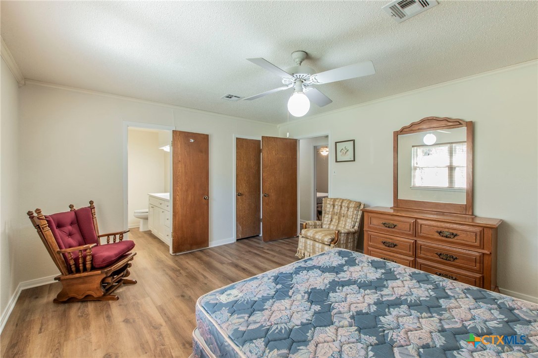517 Thompson Road Troy, TX 76579 - Photo 11 of 25 a bedroom with a bed and furniture