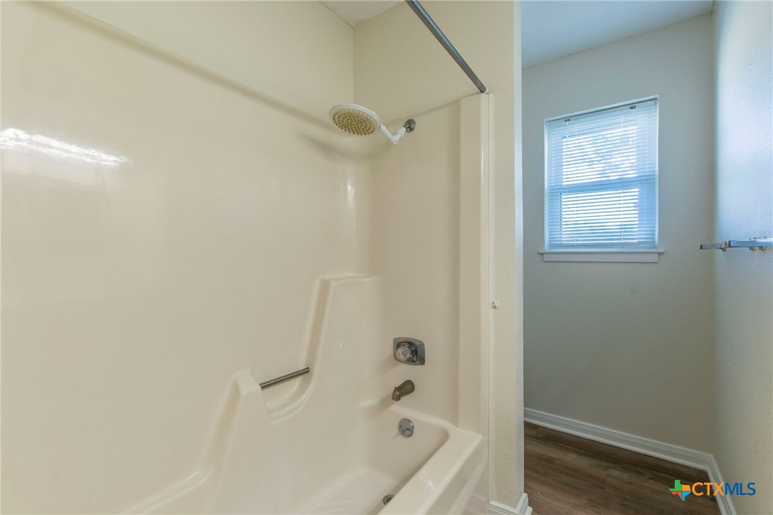 517 Thompson Road Troy, TX 76579 - Photo 16 of 25 a bathroom with a bathtub