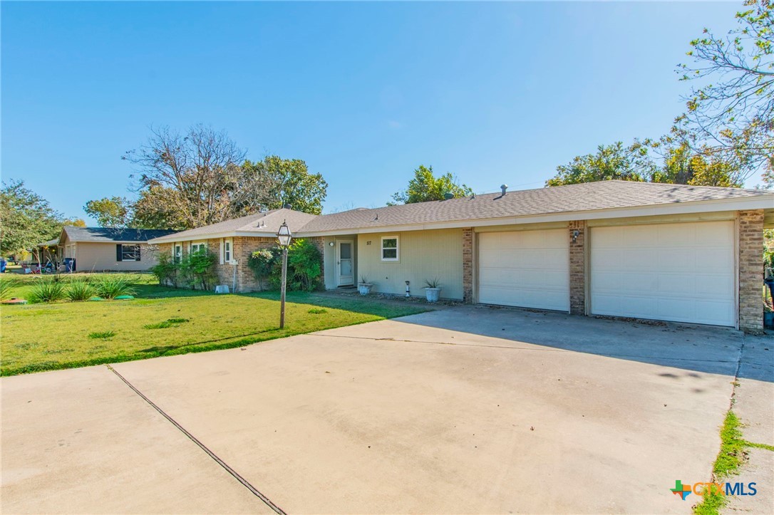 517 Thompson Road Troy, TX 76579 - Photo 21 of 25 front view of a house with a yard