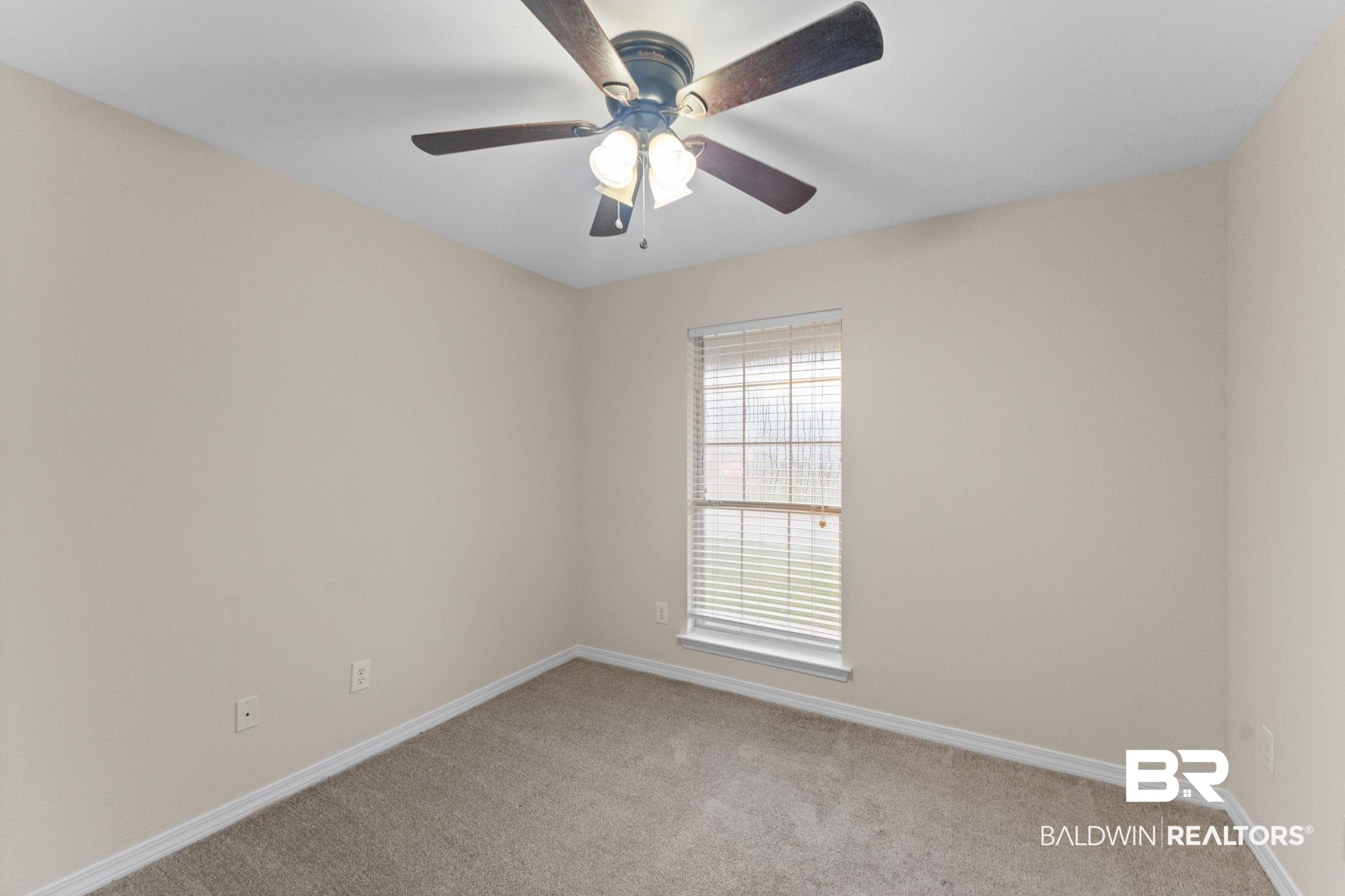 4009 Kendallbrook Loop Foley, AL 36535 - Photo 17 of 28 Unfurnished room with light colored carpet and ceiling fan