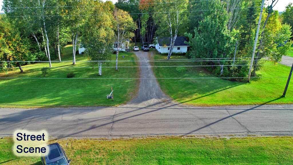 1719 Ludlow Road Houlton, ME 04730 - Photo 6 of 47 street-scene-me-log-home