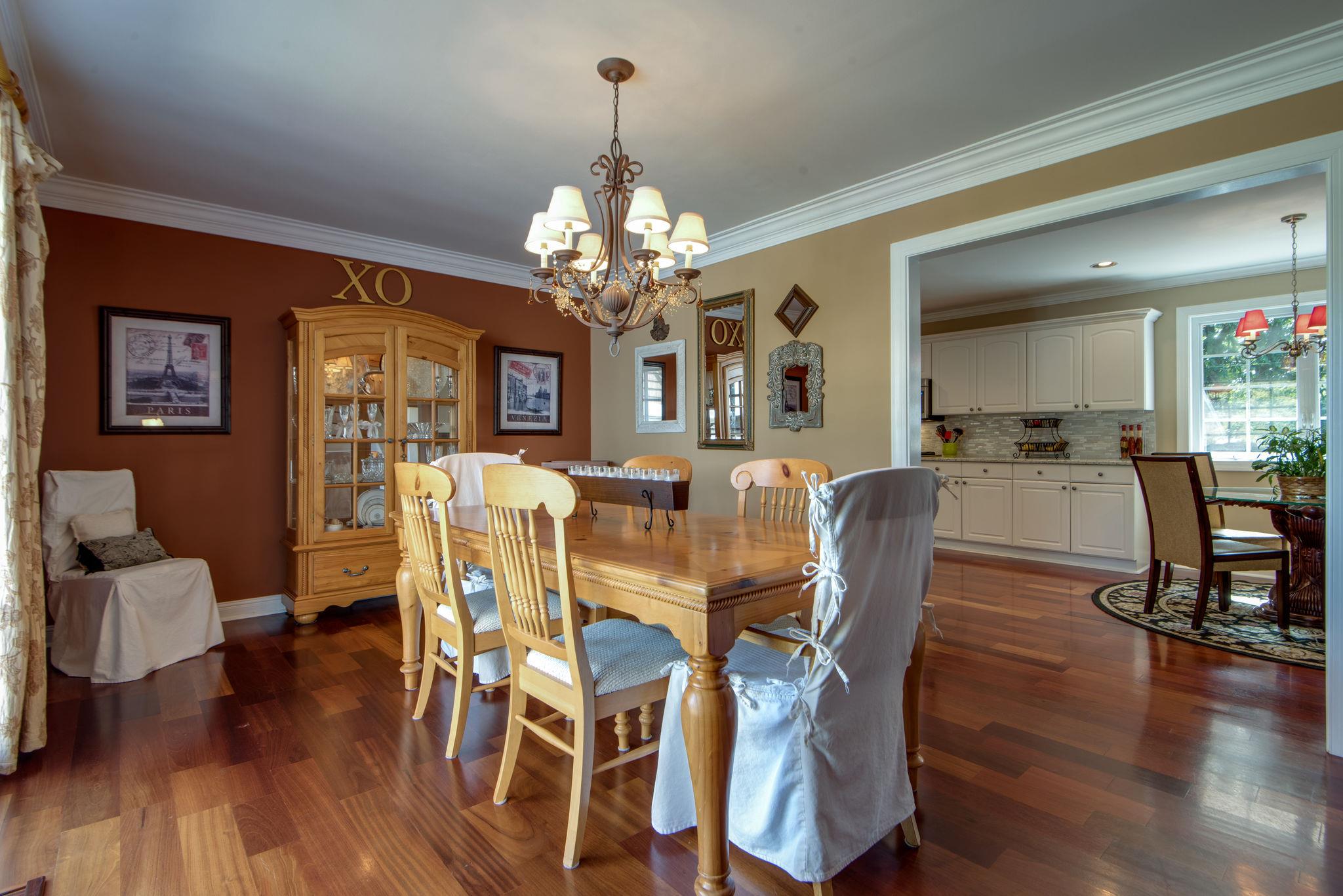 Formal Dining Room with Crown Molding and 5" Wide Brazilian Cherry Hardwoods Throughout