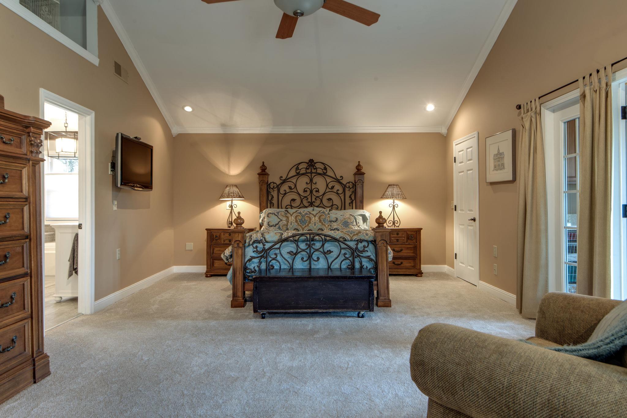 716 Murfreesboro Road Franklin, TN 37064 - Photo 8 of 30 Private 15x24 Master Suite with His and Her Walk-In Closets, a Sitting Area and a Separate "Coffee Bar" Area with French Doors Leading to a Walk-Out Balcony