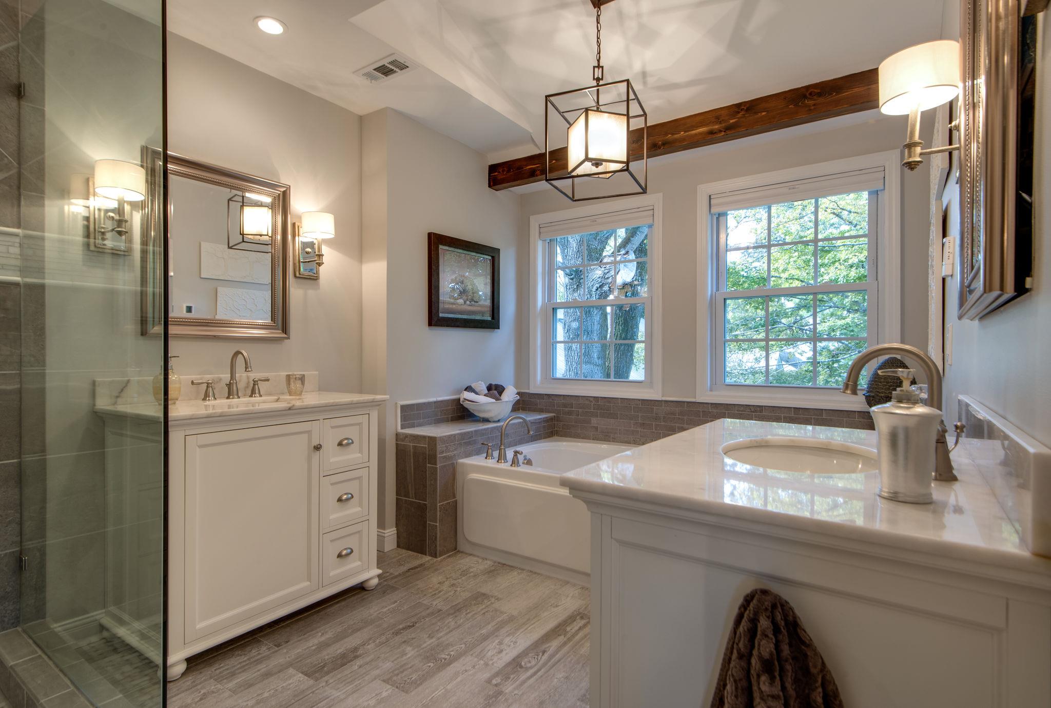 716 Murfreesboro Road Franklin, TN 37064 - Photo 9 of 30 Master Suite Bathroom - His and Her Vanities, Marble Countertops, 6' Jetted Tub, Heated Floors and Towel Bar and a Custom Tiled Shower