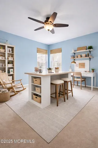 a view of a workspace with furniture