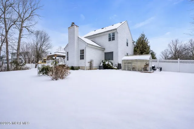 a view of road with a house