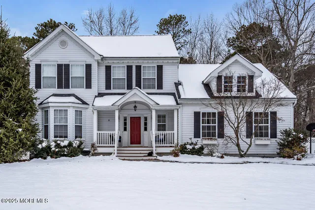 a front view of a house with yard
