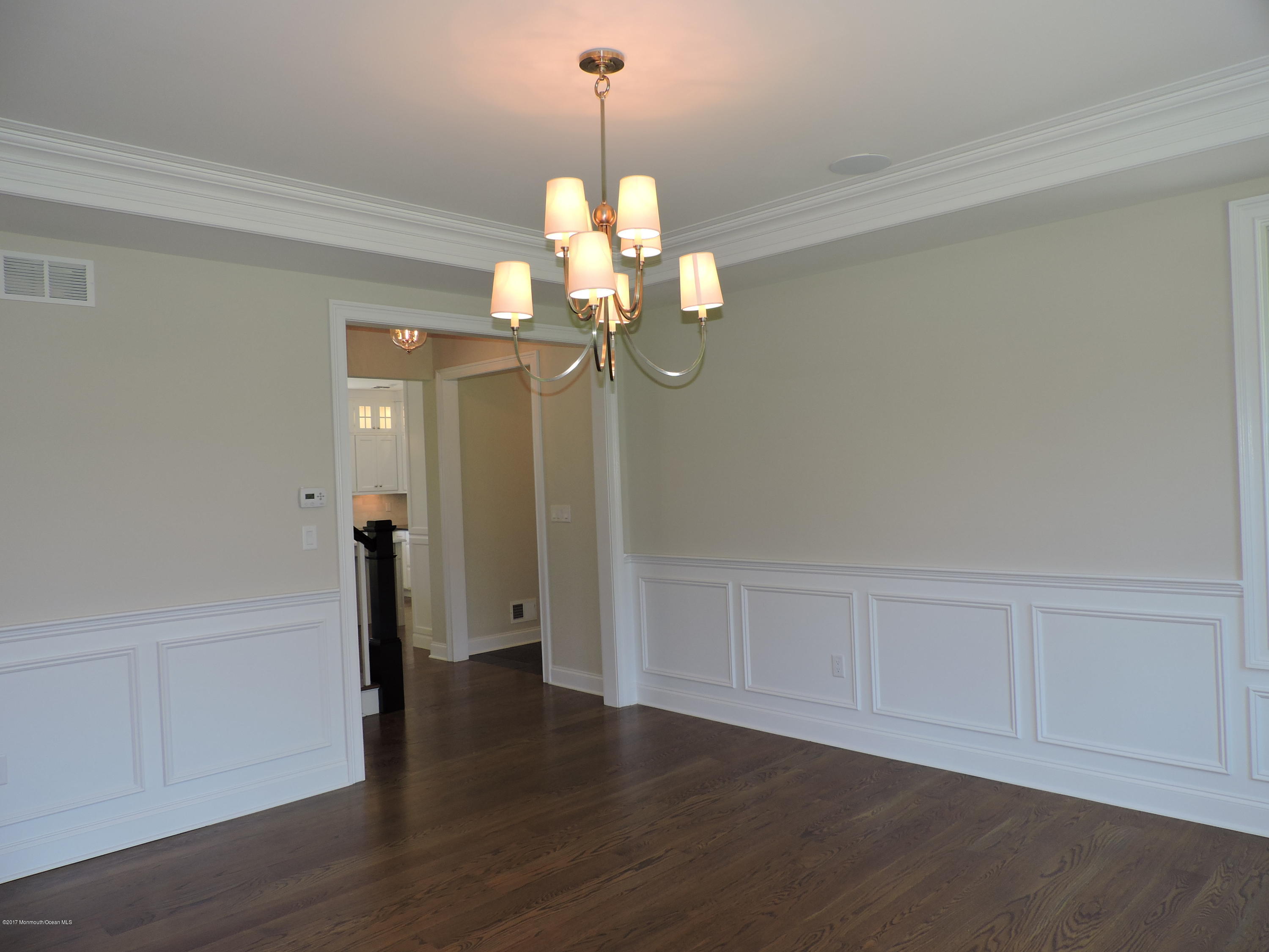 3 Forrest Way Colts Neck, NJ 07722 - Photo 7 of 26 a view of a room with wooden floor closet and windows