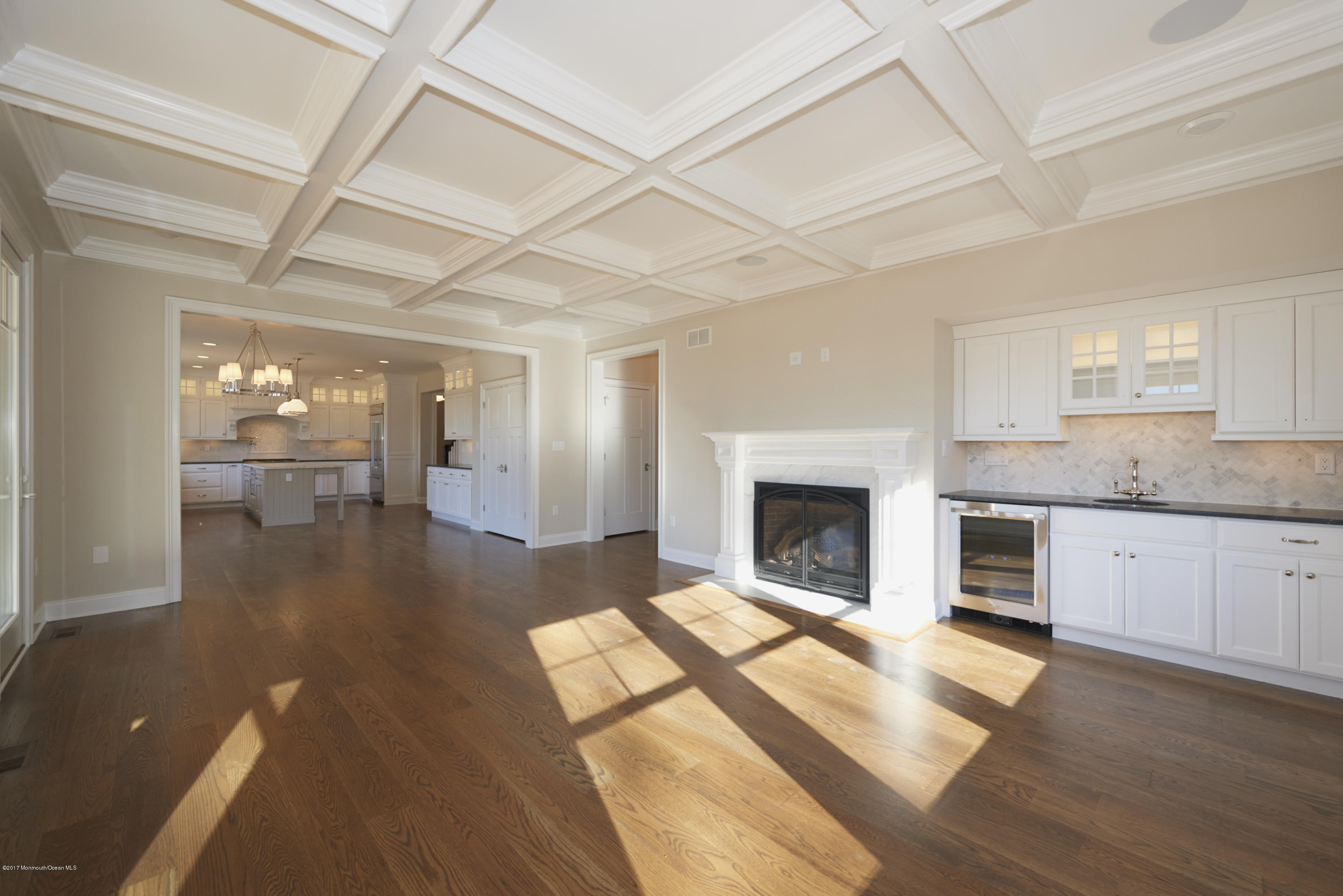 3 Forrest Way Colts Neck, NJ 07722 - Photo 10 of 26 a open kitchen with granite countertop a stove cabinets and wooden floor