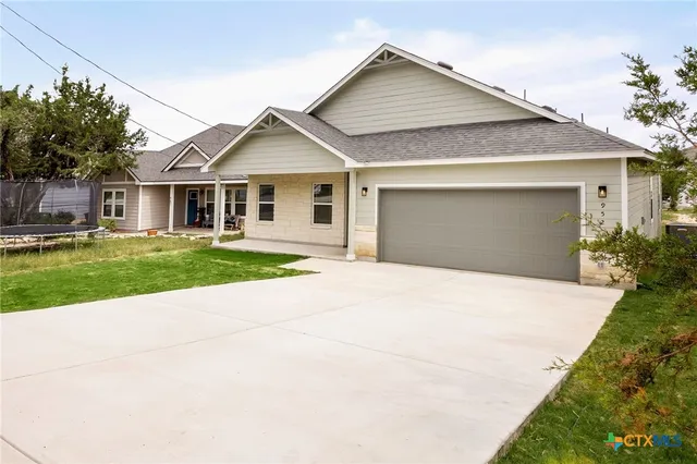 a view of a lake with a building in the background