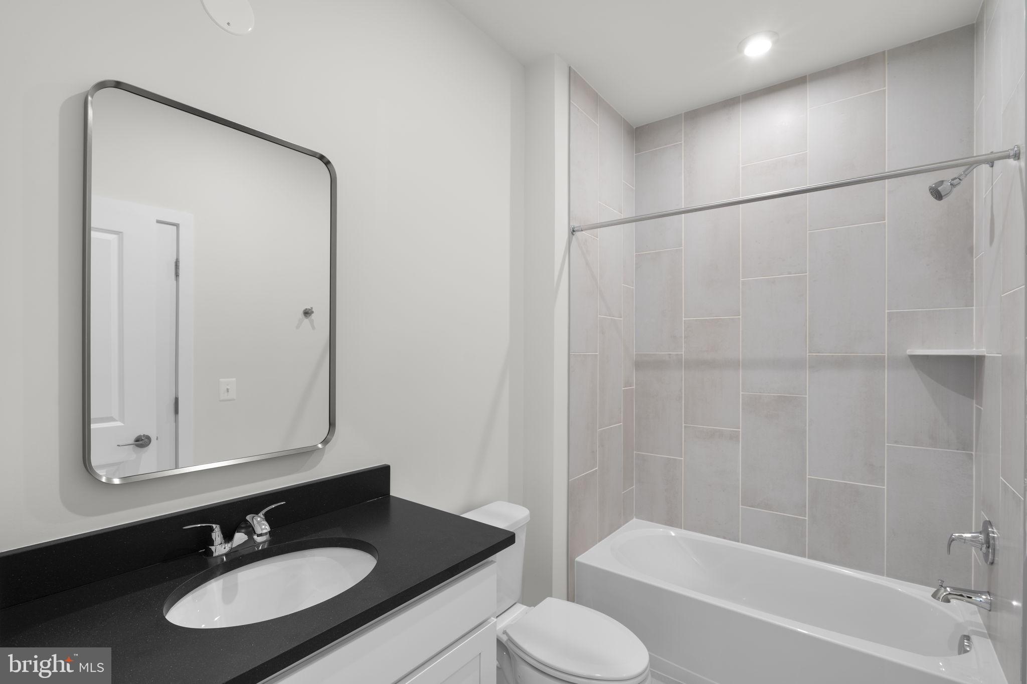 2611 Blue Rdg Avenue, Unit HOMESITE 139 Marshall, VA 20115 - Photo 20 of 49 a bathroom with a sink and a mirror