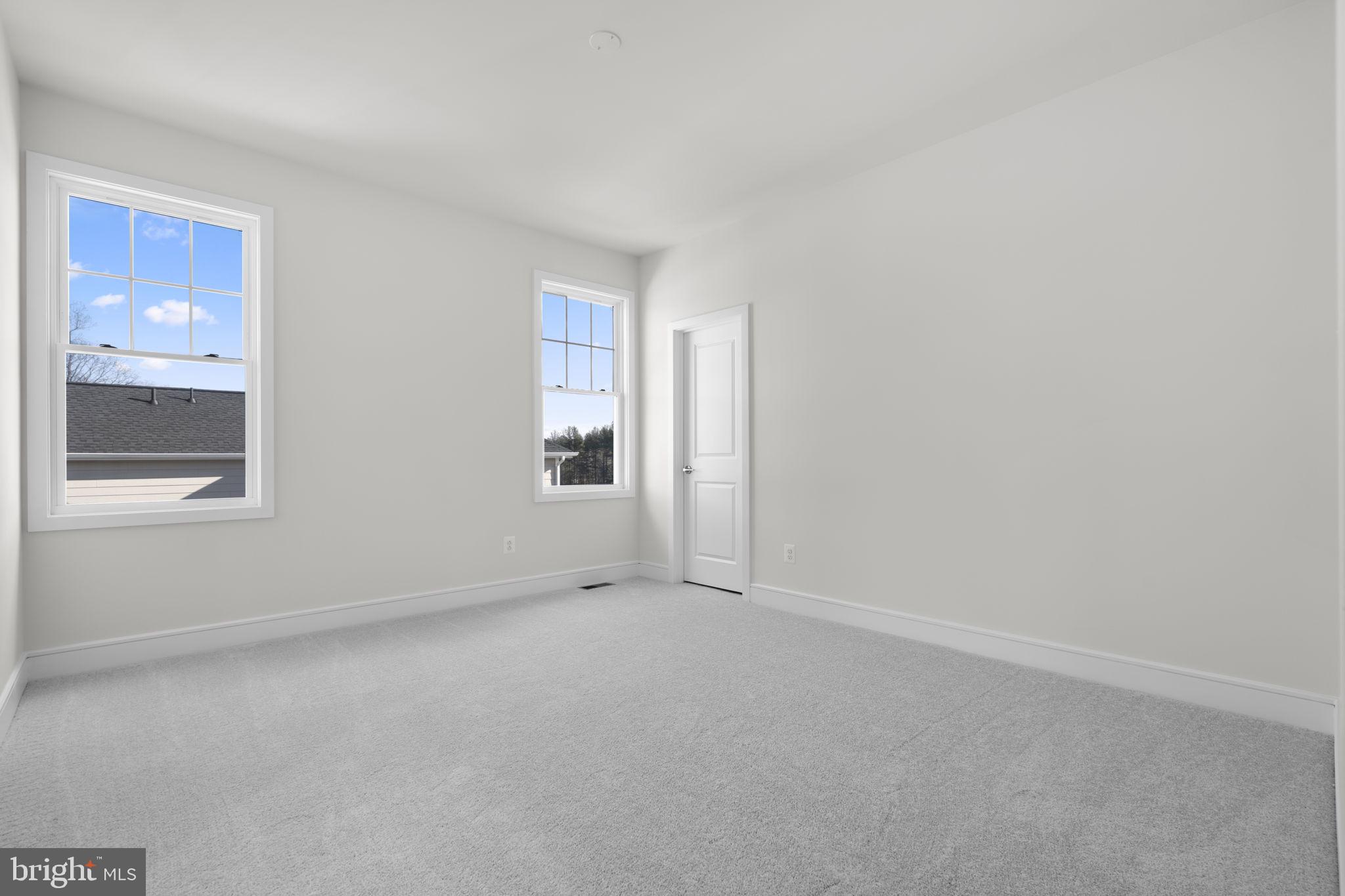 2611 Blue Rdg Avenue, Unit HOMESITE 139 Marshall, VA 20115 - Photo 22 of 49 a view of an empty room with a window