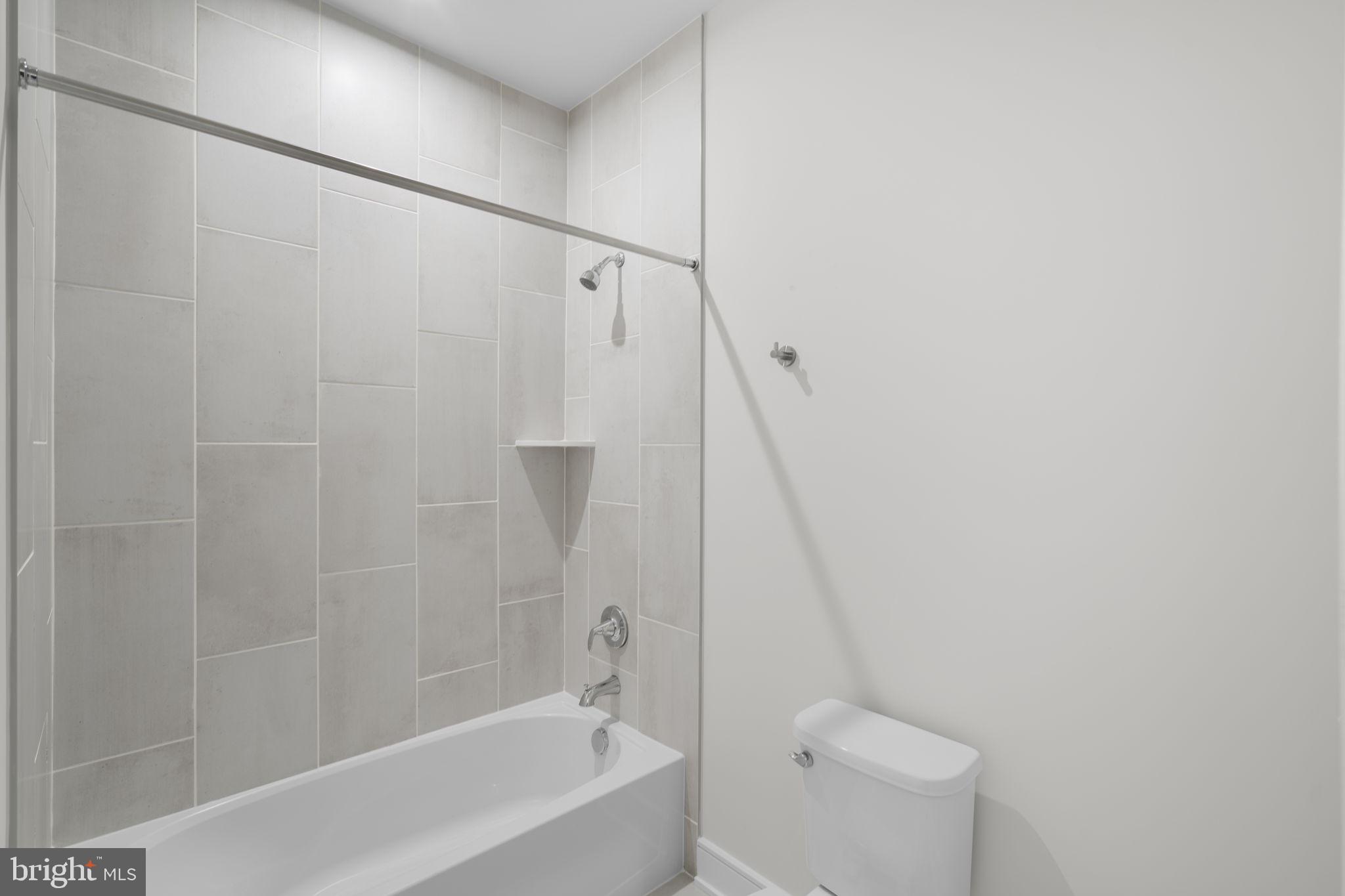 2611 Blue Rdg Avenue, Unit HOMESITE 139 Marshall, VA 20115 - Photo 24 of 49 a bathroom with a shower and a toilet